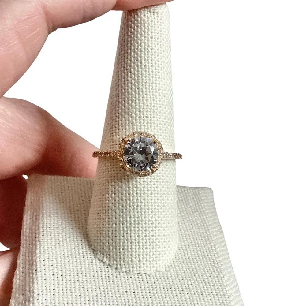 Round Clear Stone Set in Gold Tone Band Mini Side Stone Detailing Size 8.75